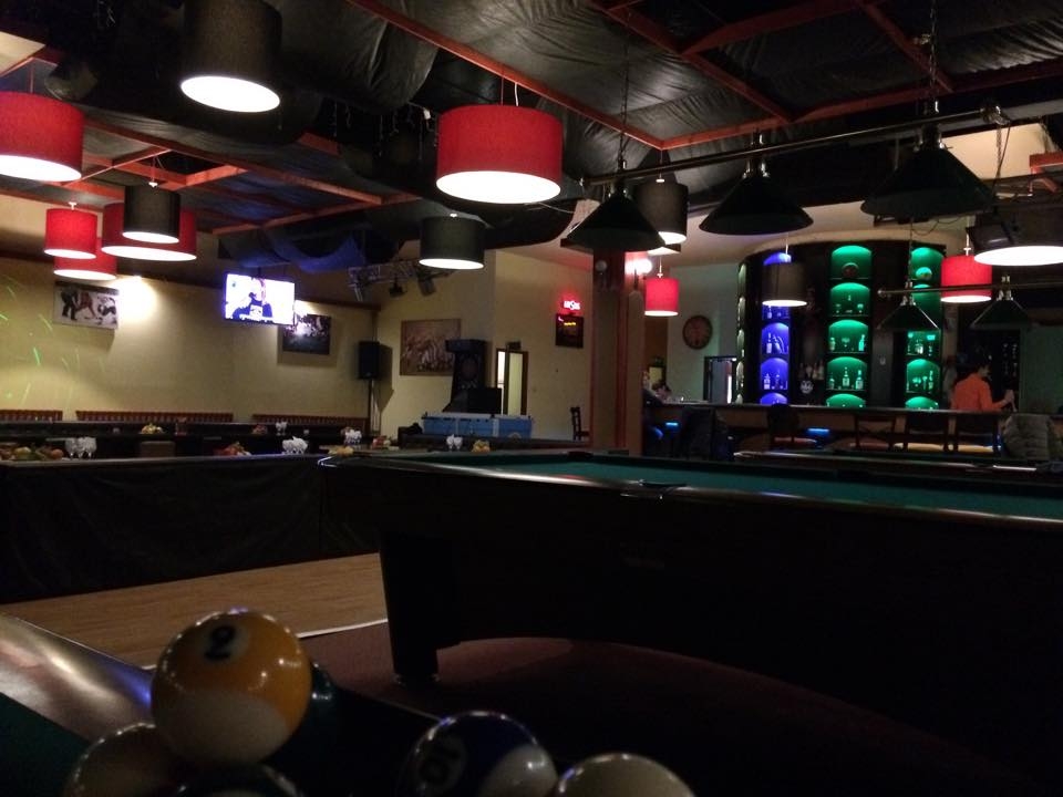 The bar of Mercury's first hall in Titan: red lampshades and green LED